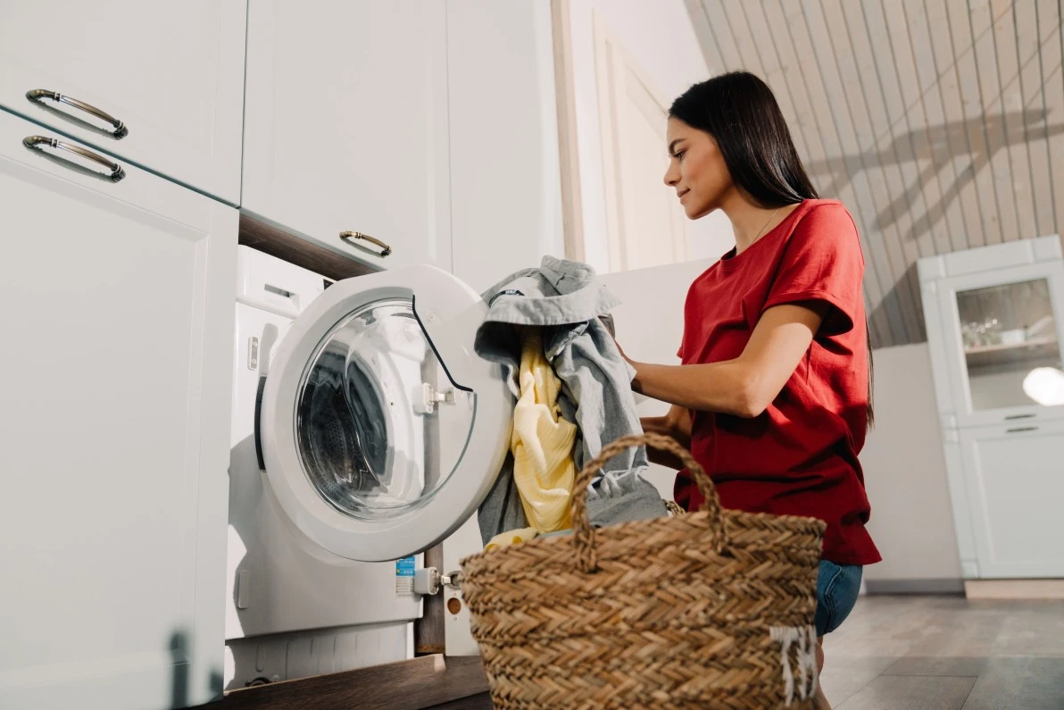 Support worker doing the laundry